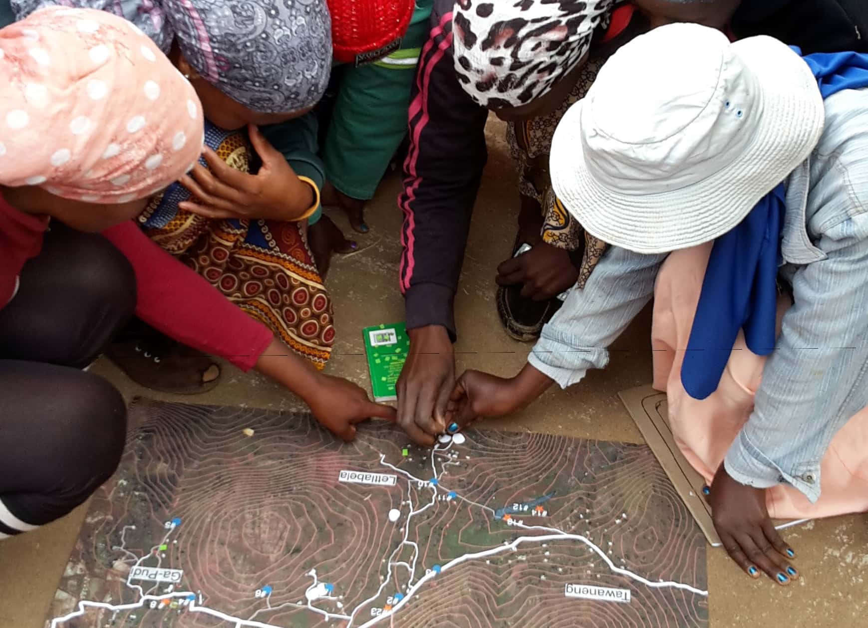 Women indicating their preferred sites for new communal water points in Ga-Moela, South Africa